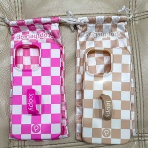 Two Loopy cases. iPhone 13 Pro. Styles: sand dollar checkered & pink checkered